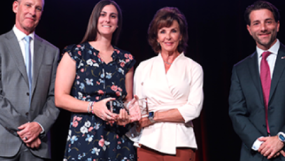 Leah Palmer receiving award
