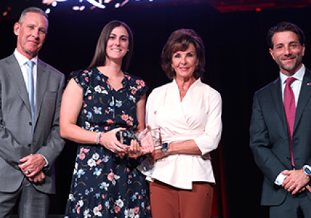Leah Palmer receiving award